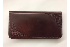 Jednoduchá kožená peněženka s raženým ornamentem hnědočervená